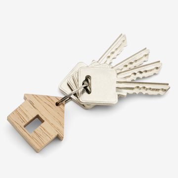 Wooden keychain on white background